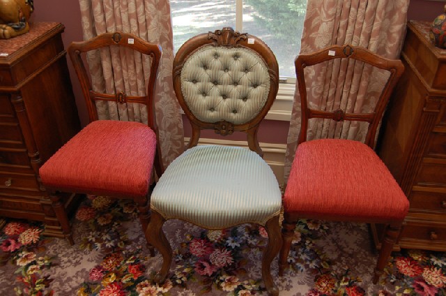 Appraisal: A PAIR OF LATE VICTORIAN CEDAR SALON CHAIRS Together with