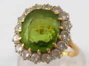 Appraisal: An carat gold peridot and diamond ring peridot approx x