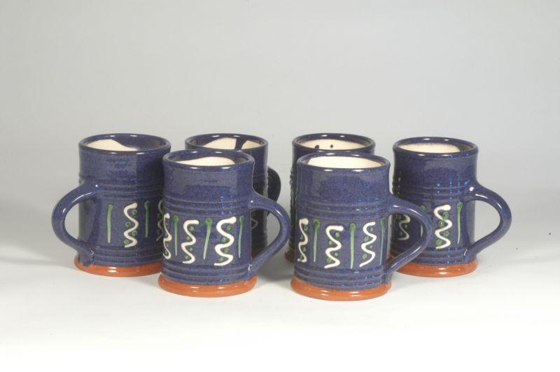 Appraisal: Signed Westmoore Six blue mugs with slip trailing H -