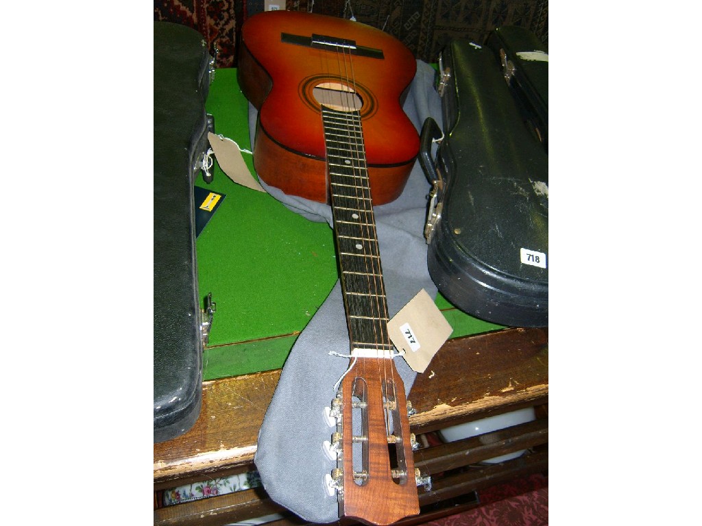 Appraisal: A small guitar with label to interior Encore model number