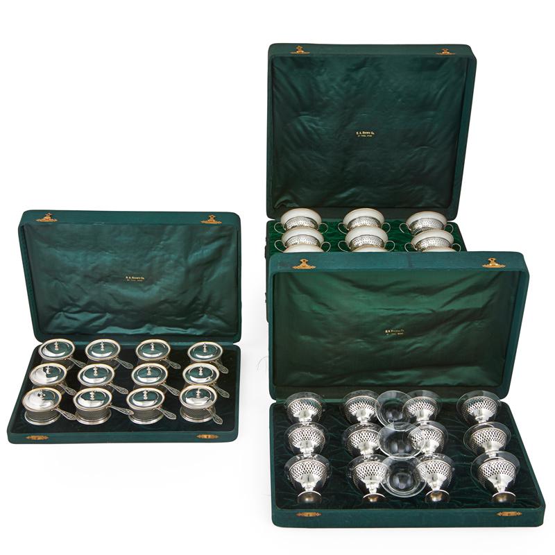 Appraisal: EDWARDIAN CASED STERLING FOR THE TABLE Three cased sets of