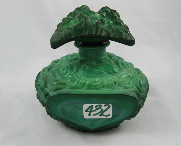 Appraisal: A MALACHITE GREEN GLASS PERFUME BOTTLE having raised flowers on