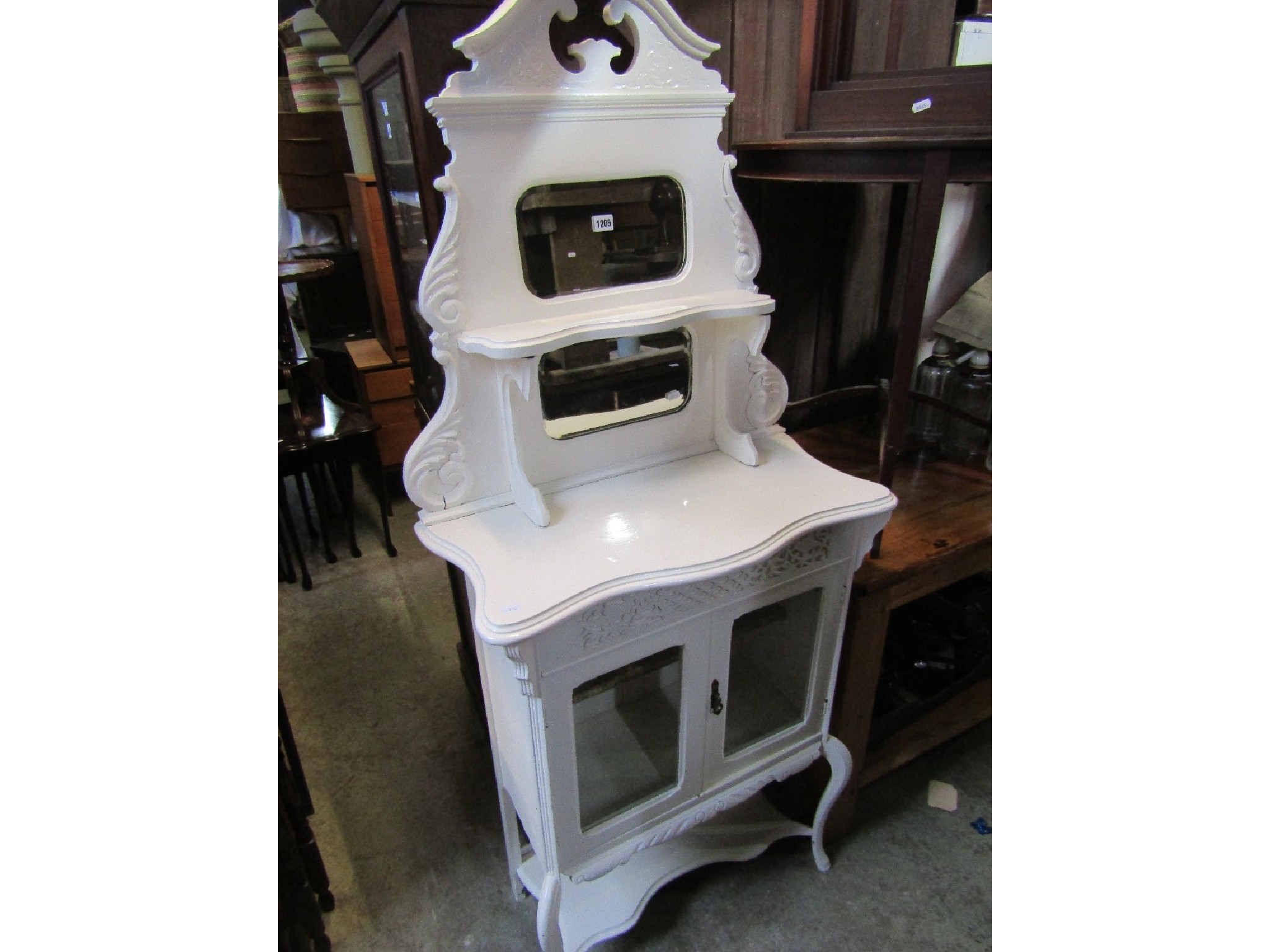 Appraisal: An Edwardian freestanding side cabinet chiffonier with later painted finish