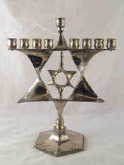 Appraisal: Judaica A silver plated modernist chanukia the central stylish Magen