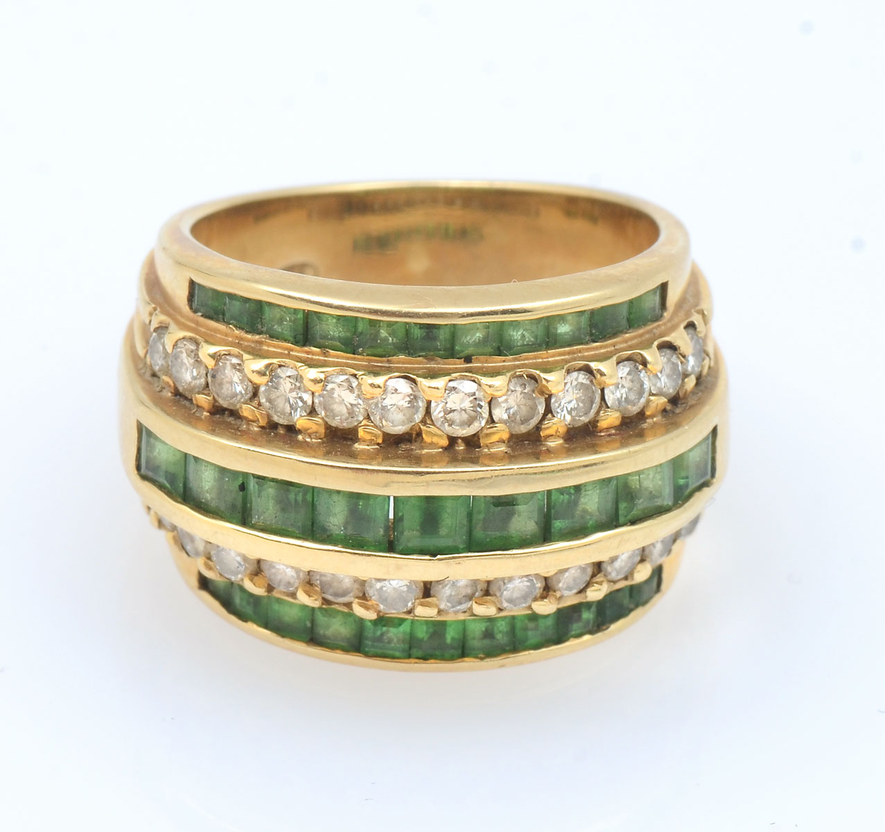 Appraisal: K TSAVORITE DIAMOND RING K yellow gold ring contains round