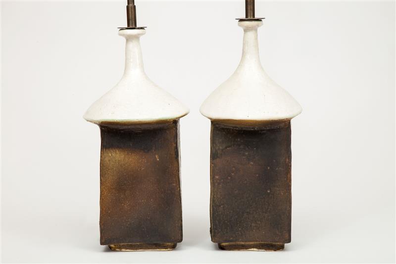 Appraisal: Two Lamps Scandinavian c White and brown-glazed pottery x in