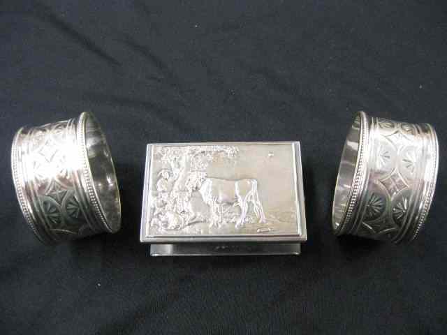 Appraisal: Victorian Silverplate Napkin Rings and match holder with cow