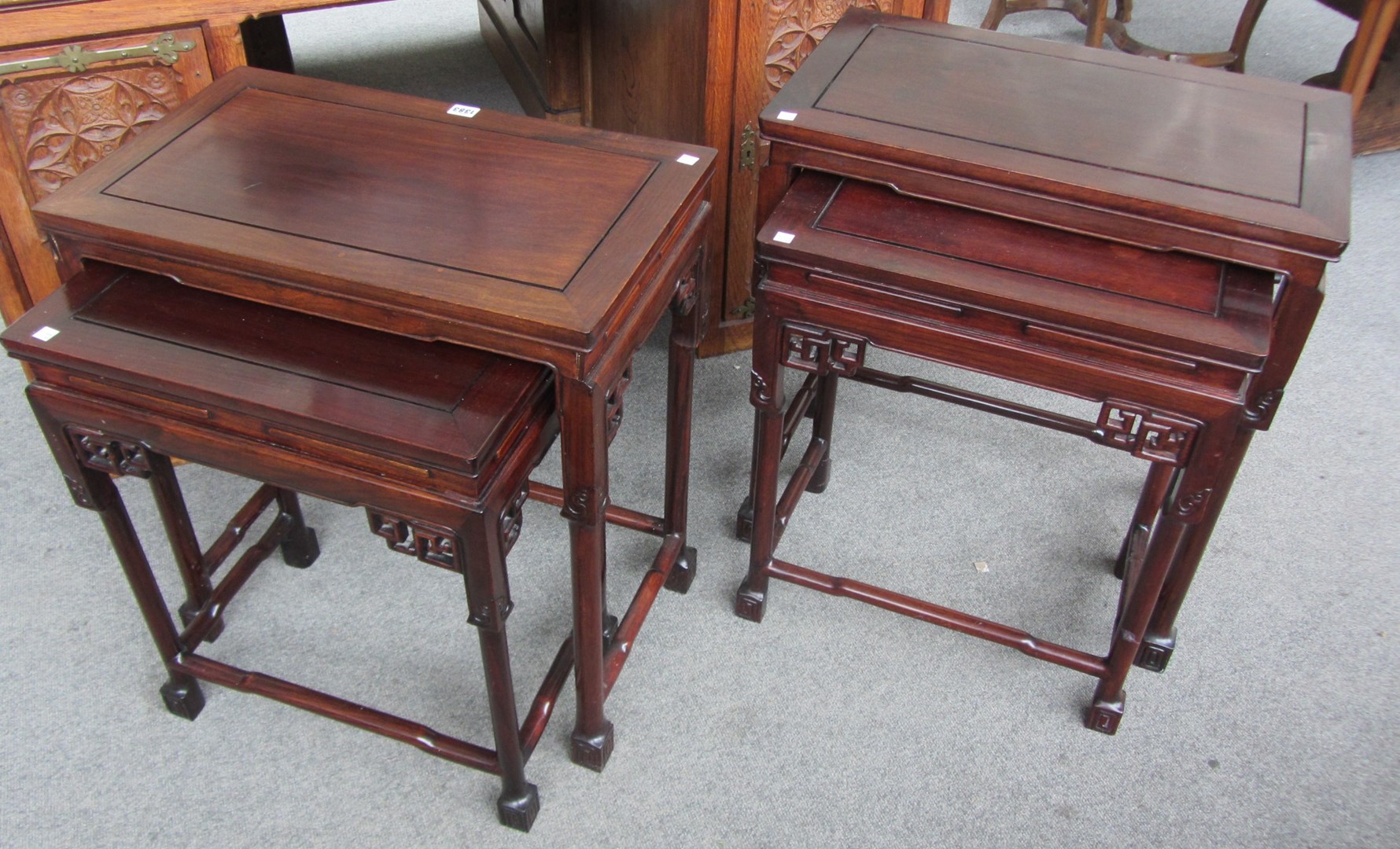 Appraisal: A th century Chinese hardwood nest of two graduated tables