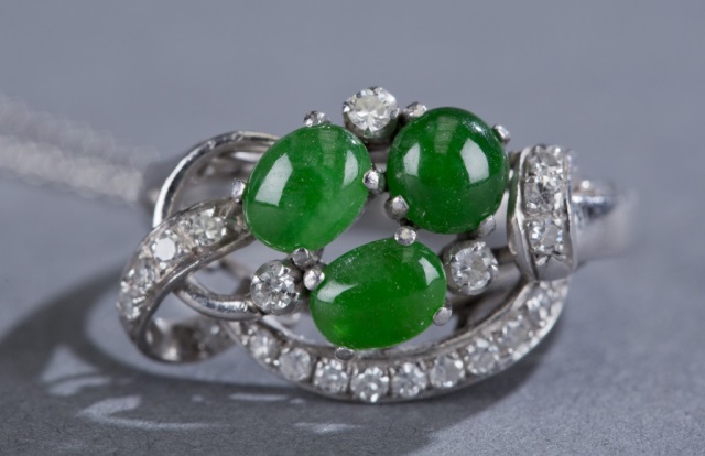 Appraisal: Art Deco Jadeite and Diamond Ring Three oval jadeite stones