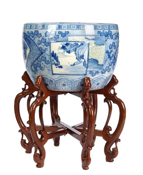 Appraisal: A Chinese blue and white jardiniere on hardwood stand height