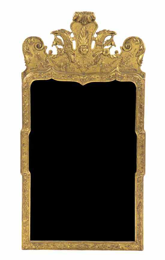 Appraisal: A Queen Anne Style Giltwood Mirror having a foliate and