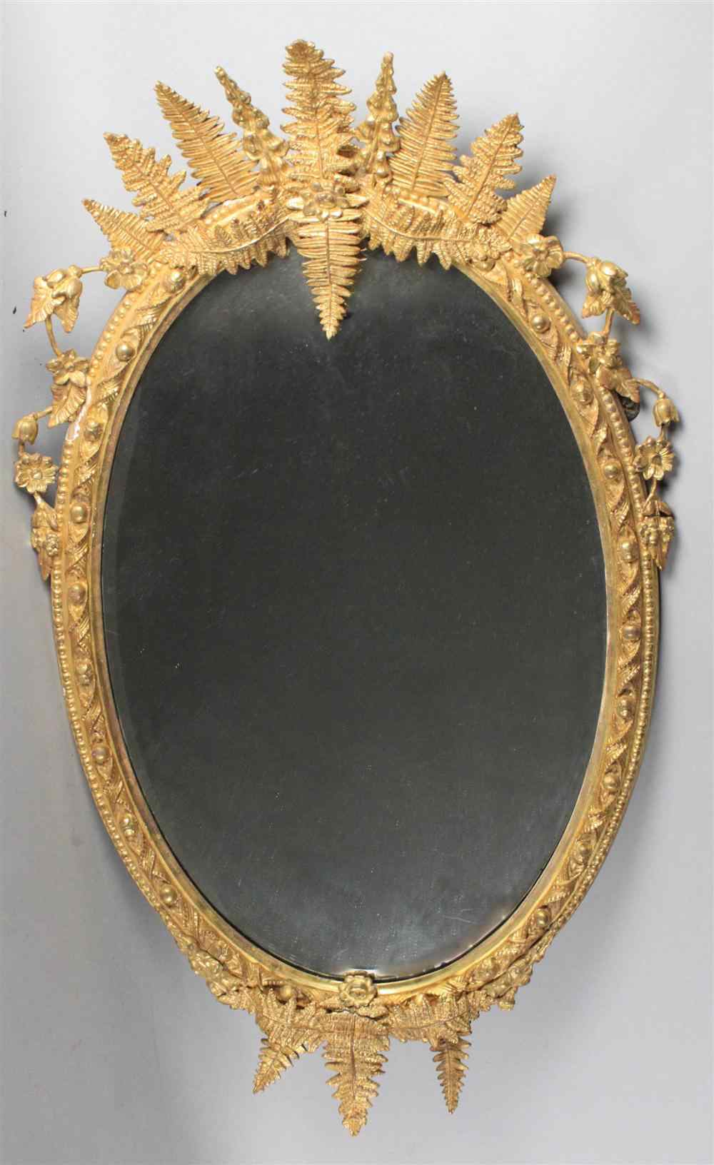 Appraisal: VICTORIAN FERN FROND LEAF TIP CARVED GILTWOOD MIRROR th century