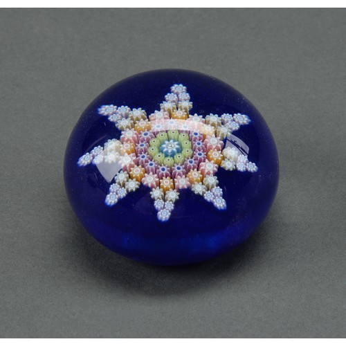 Appraisal: A glass millefiori paperweight th c of star form on