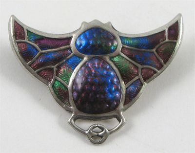 Appraisal: A Charles Horner enamelled silver brooch modelled as a stylised