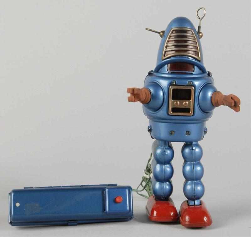 Appraisal: Tin Litho Planet Robot Battery-Operated Toy Description Japanese Working Made