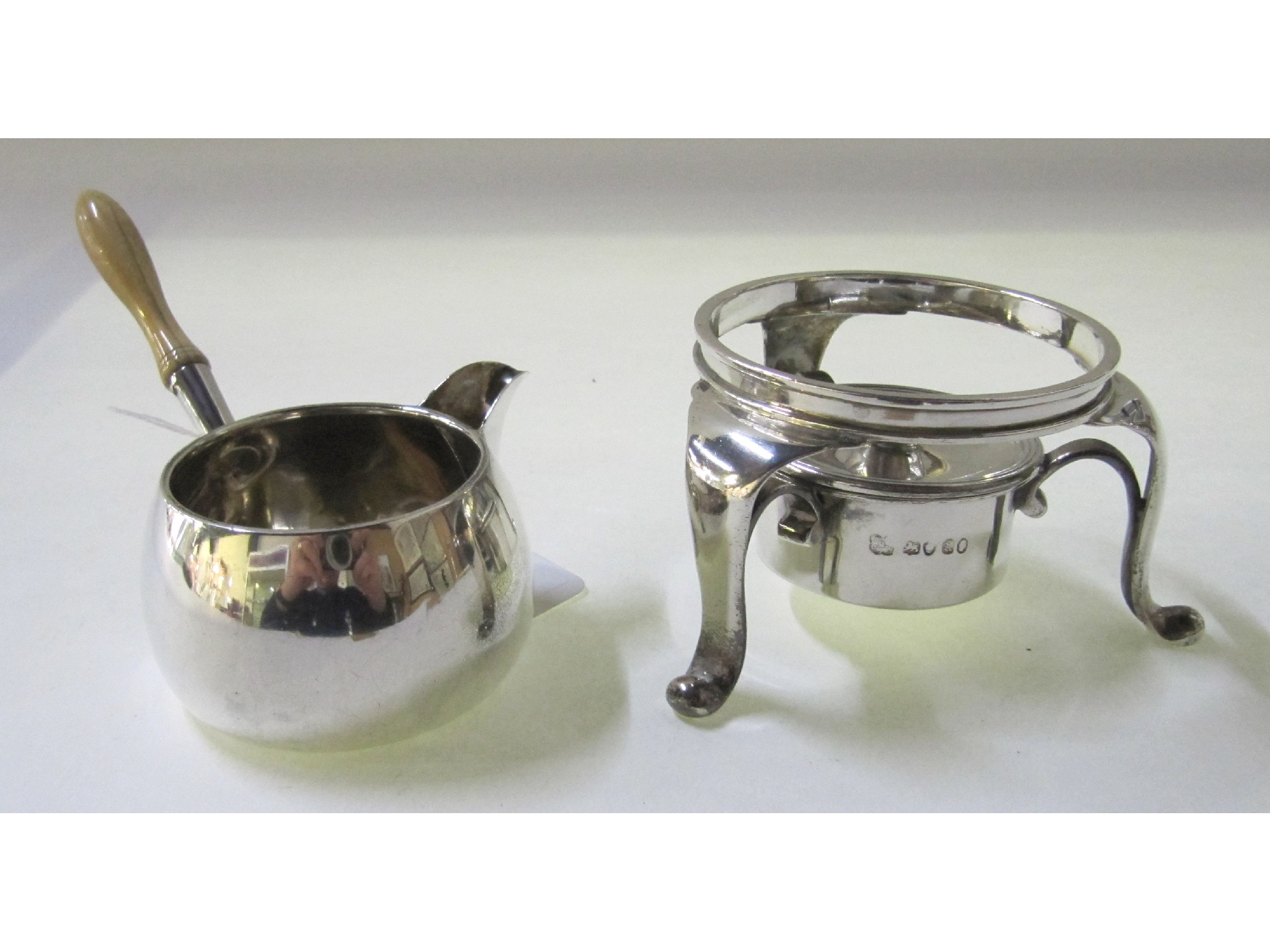 Appraisal: A William IV silver spirit burning warmer base London with