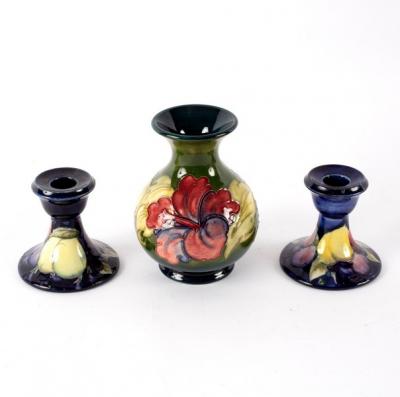 Appraisal: A Moorcroft Hibiscus pattern vase cm high and a pair