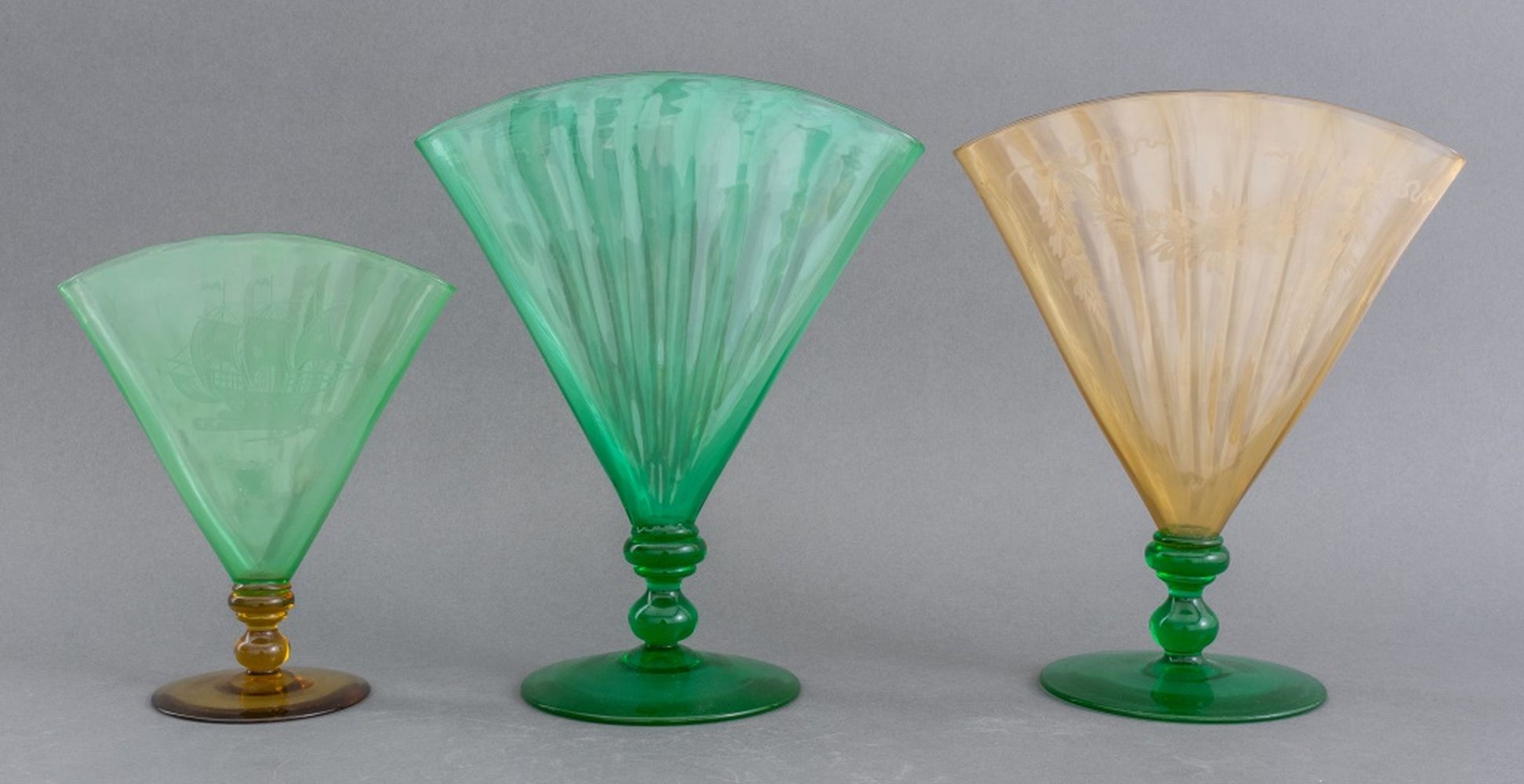 Appraisal: STEUBEN COLORED GLASS FAN VASE SET OF Set of three