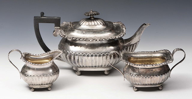 Appraisal: A LATE VICTORIAN SILVER THREE PIECE TEA SET oval shaped