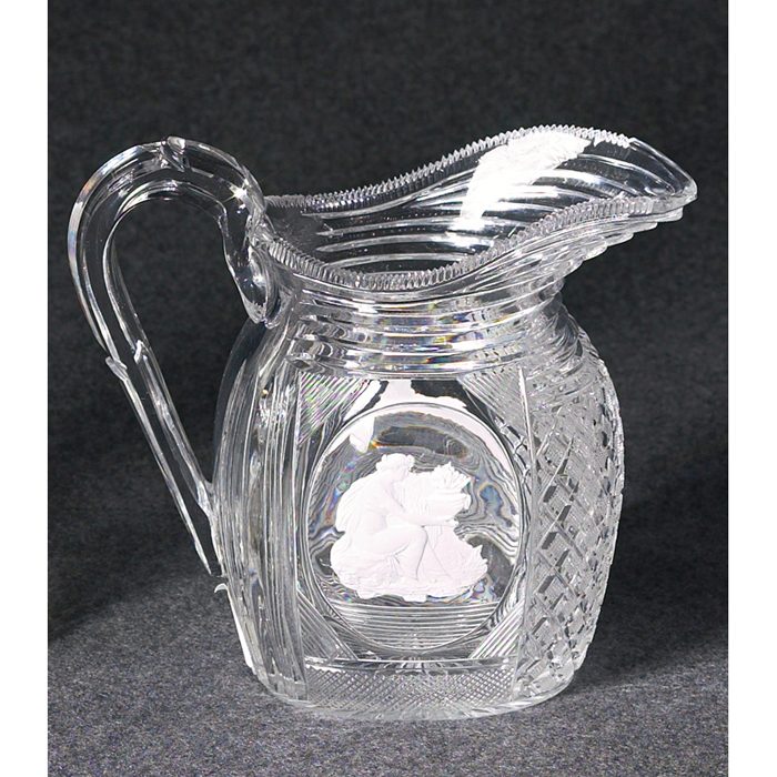 Appraisal: English pitcher clear with inset designs in white on each