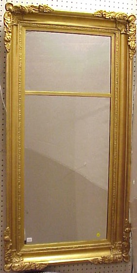 Appraisal: Wall mirror th C two part gilt frame with foliate