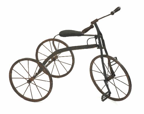 Appraisal: A cast iron tricycle with turned wooden handles leather seat