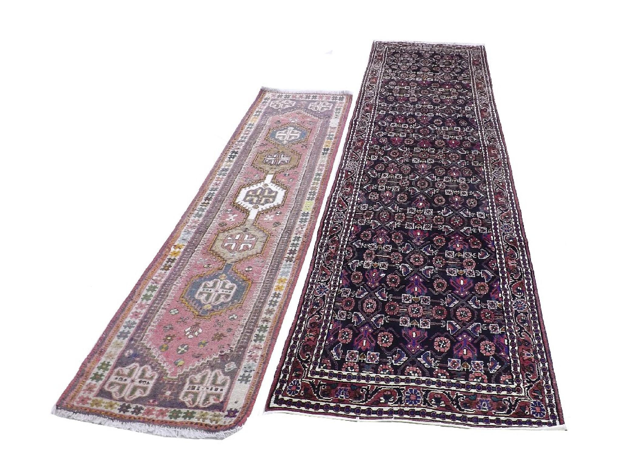 Appraisal: Large Persian runner decorated with various blue and green medallions