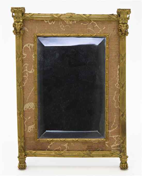 Appraisal: A Neoclassical Gilt Bronze Dressing Mirror the rectangular beveled plate