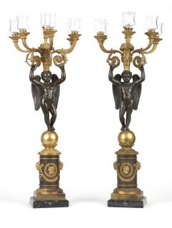 Appraisal: A pair of Empire style gilt patinated bronze candelabra th