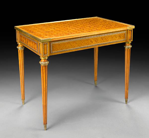 Appraisal: A Louis XVI style gilt bronze mounted marquetry writing table