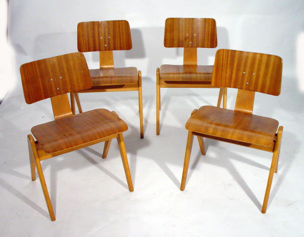 Appraisal: Set of four Hille stacking chairs with walnut veneered seats