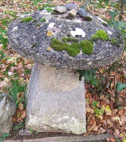 Appraisal: A staddle stone on a square tapering base cm ''