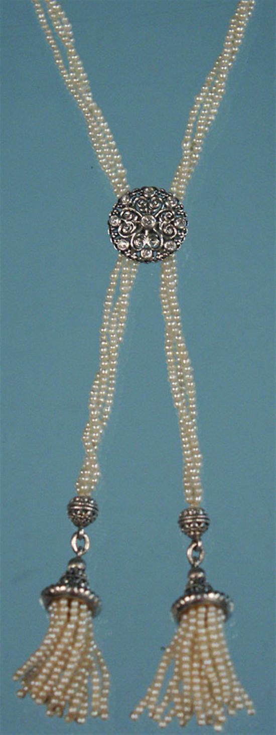 Appraisal: WHITE GOLD DIAMOND AND SEED PEARL LARIAT NECKLACE Provenance Property