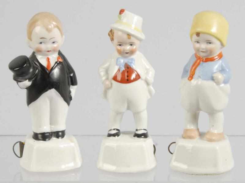 Appraisal: Lot of Porcelain Figural Sewing Tape Measures Description Includes one