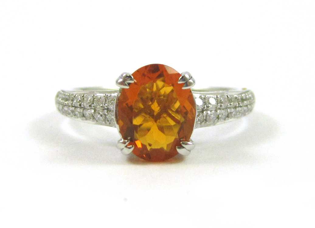 Appraisal: FIRE OPAL DIAMOND AND FOURTEEN KARAT GOLD RING The white