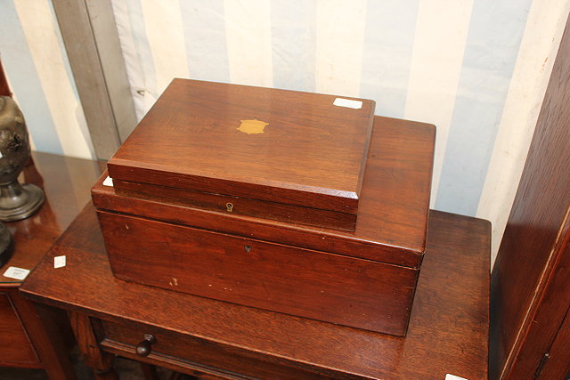 Appraisal: AN OLD MAHOGANY CANTEEN CASE cm wide together with a