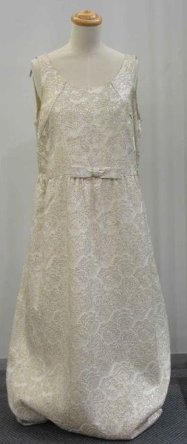 Appraisal: Evening dress in cream lurex brocait with bow detail to