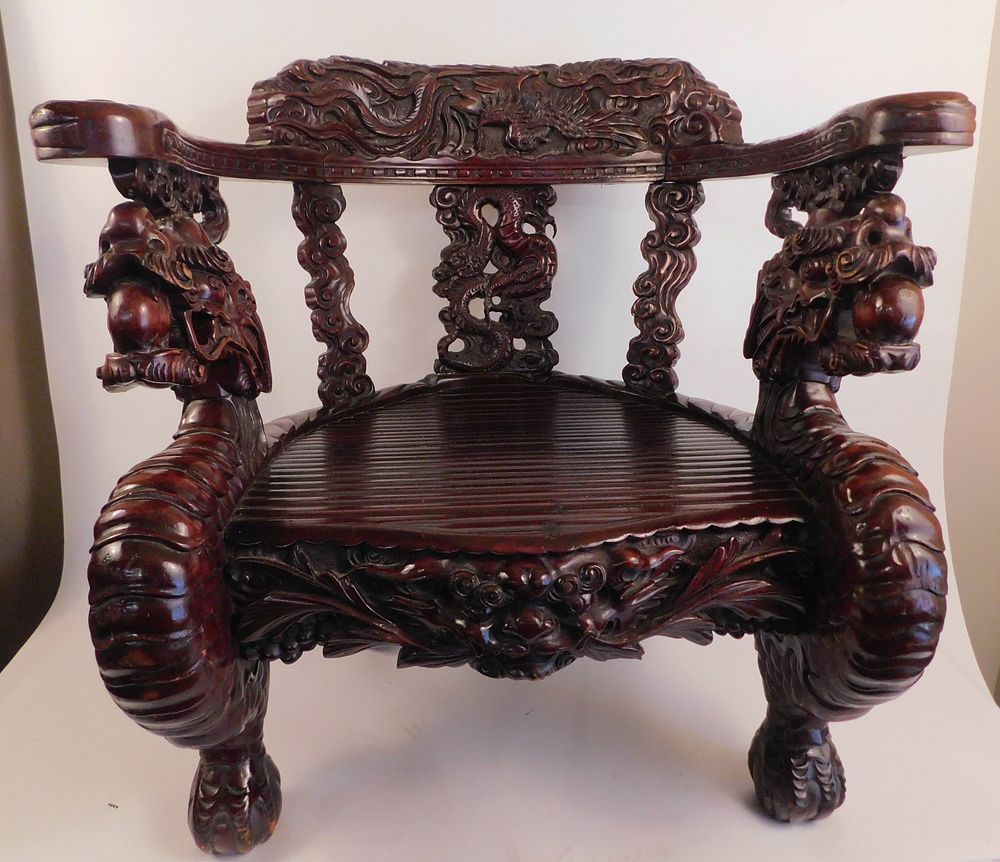 Appraisal: JAPANESE DRAGON THRONE CHAIR Highly carved th century Japanease carved