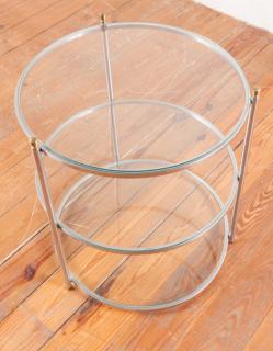 Appraisal: Round Three Contemporary round three-tier side table with glass shelves