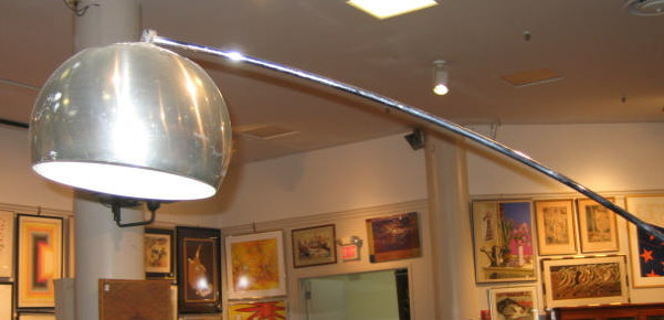 Appraisal: CHROMED METAL ARC LAMP tubular raised on weighted rectangular base