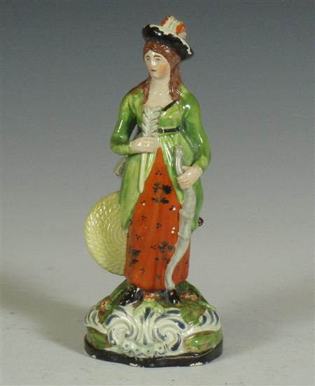 Appraisal: An early th century Staffordshire figure of a female archer