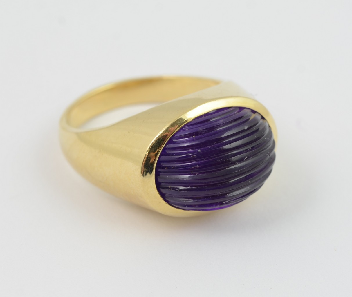 Appraisal: K yellow gold ribbed oval amethyst ring size