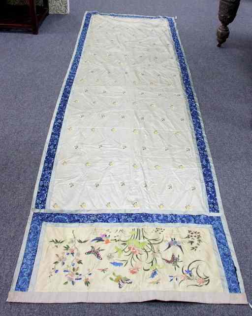 Appraisal: A Chinese embroidered silk panel one end with birds and