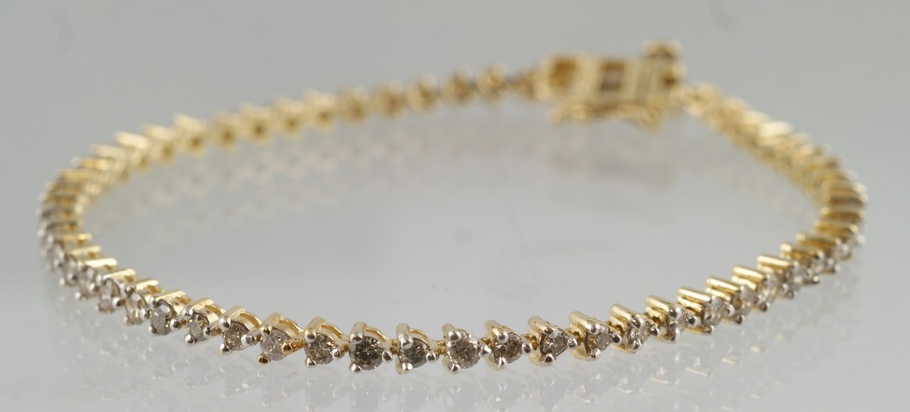 Appraisal: K YG tennis bracelet diamonds about - pts each dwt