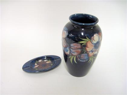 Appraisal: Two Moorcroft pottery articlesComprising a baluster form vase decorated with