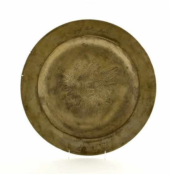 Appraisal: German pewter charger th century round shallow bowl decorated with