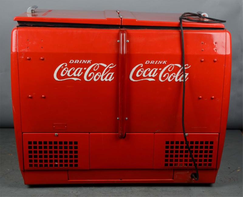 Appraisal: Westinghouse Coca Cola Dry Cooler Vending Machine This red top-opening