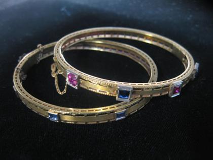 Appraisal: Group of two karat yellow gold bangle bracelets Two hinged