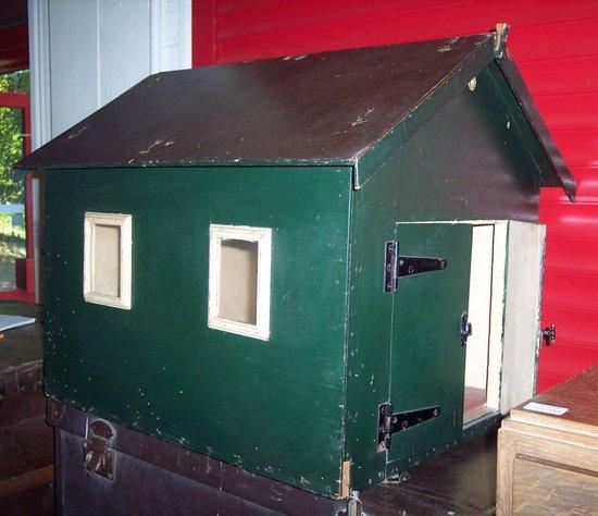 Appraisal: A child's green painted garage with windows at the sides