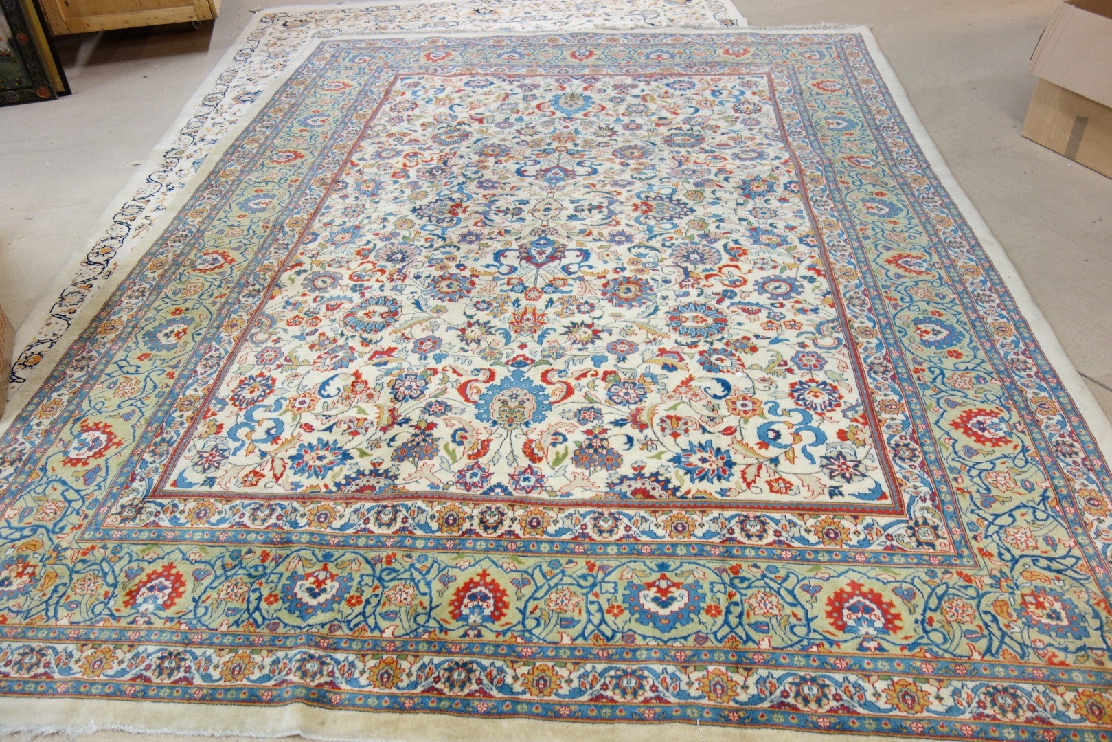 Appraisal: An Indian carpet the ivory field with an allover floral